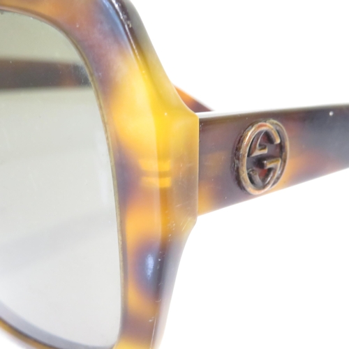 375 - 7 x Designer Sunglasses including  Gucci / French Connection / Timberland / Fossil / Dolce & Gabbana