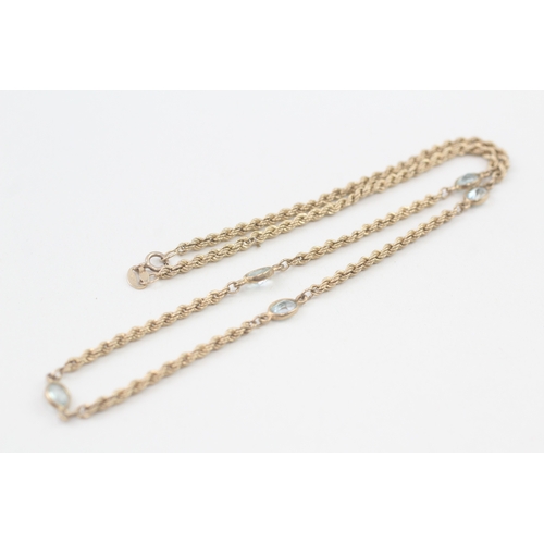 107 - 9ct gold topaz twisted rope necklace (4.3g)