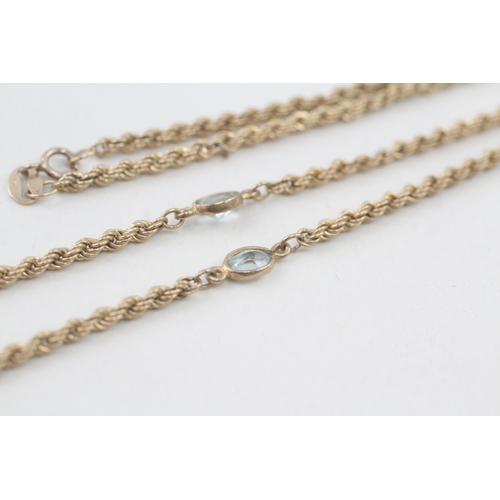 107 - 9ct gold topaz twisted rope necklace (4.3g)