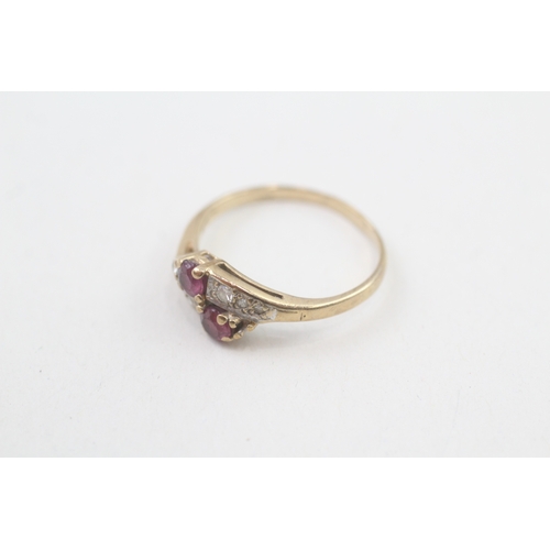 118 - 9ct gold diamond & ruby bypass ring (1.6g) AS SEEN - MISHAPEN Size  M