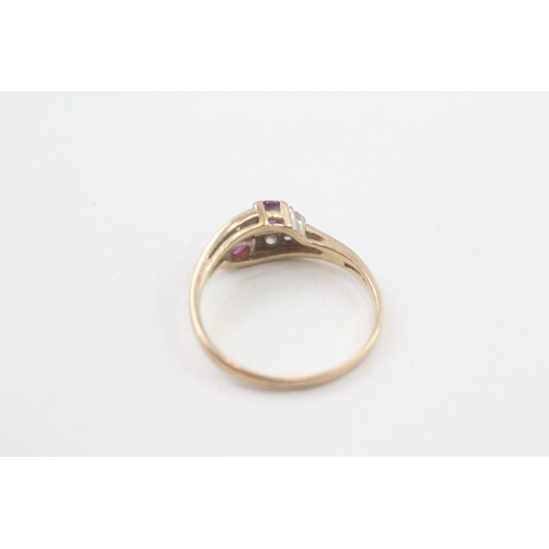 118 - 9ct gold diamond & ruby bypass ring (1.6g) AS SEEN - MISHAPEN Size  M