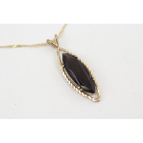 22 - 9ct gold marquise cut smokey quartz pendant necklace (3g)