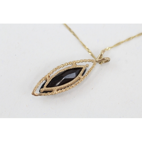 22 - 9ct gold marquise cut smokey quartz pendant necklace (3g)