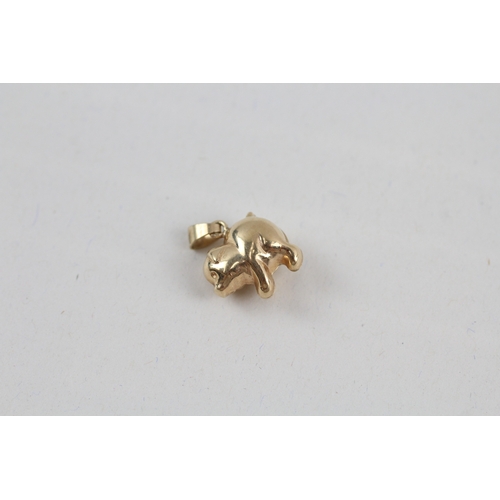 23 - 9ct gold pig pendant (0.6g)