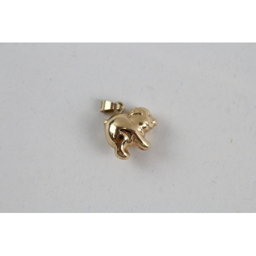 23 - 9ct gold pig pendant (0.6g)