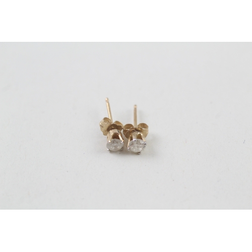 25 - 9ct gold diamond single stone stud earrings (0.5g)