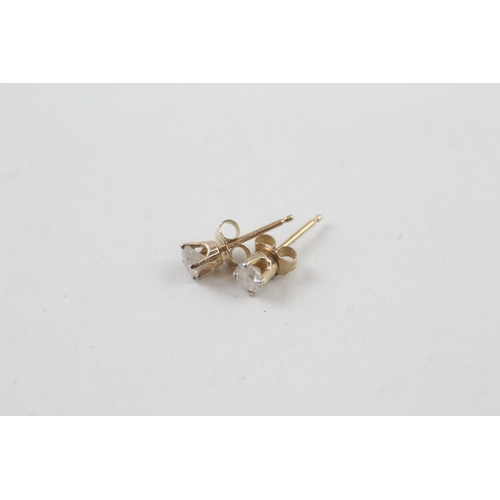 25 - 9ct gold diamond single stone stud earrings (0.5g)