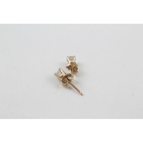 25 - 9ct gold diamond single stone stud earrings (0.5g)