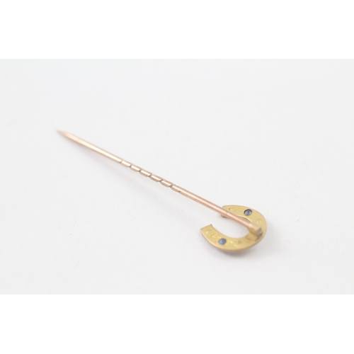 28 - 9ct gold antique seed pearl & sapphire paste horseshoe stickpin (0.8g)