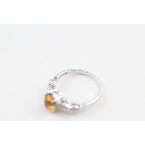 29 - 9ct white gold oval cabochon citrine single stone ring (2.4g) Size  O