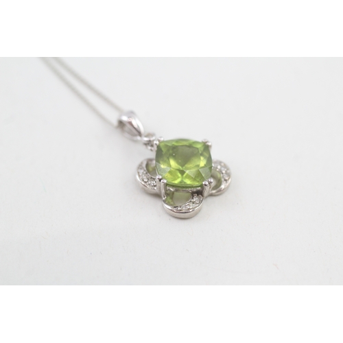 38 - 9ct white gold diamond & peridot clover pendant necklace (2.8g)