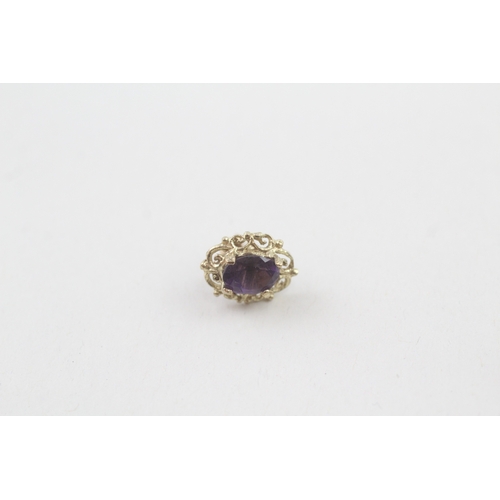 39 - 9ct gold amethyst single stone stud earrings (1.6g)