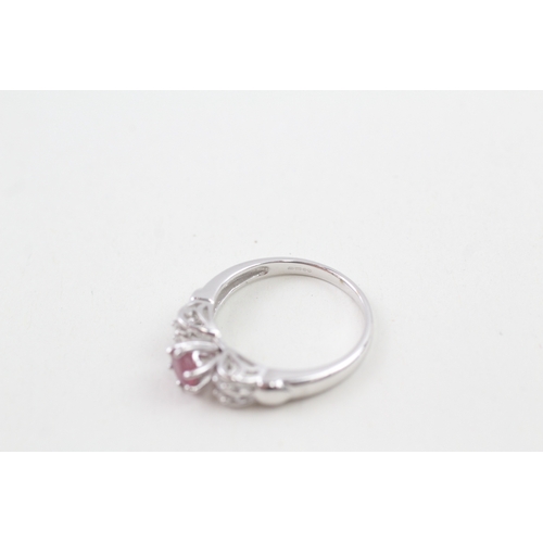 40 - 9ct white gold pink tourmaline single stone ring with diamond set openwork shoulders (2.7g) Size  N ... 