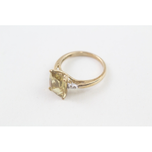 48 - 9ct gold heliodor single stone ring with diamond sides (2.6g) Size  N