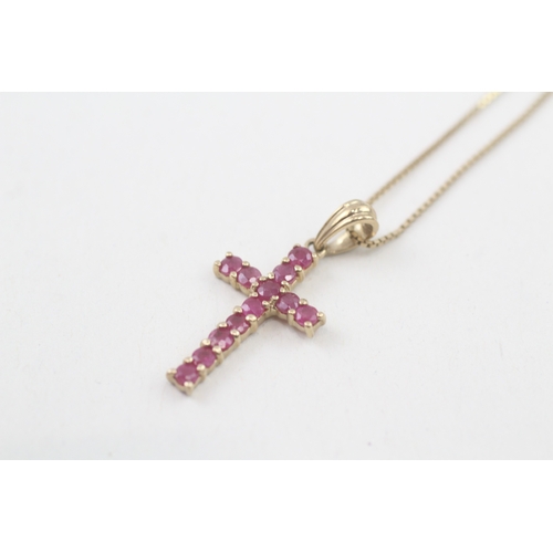 49 - 9ct gold ruby cross pendant necklace (1.8g)