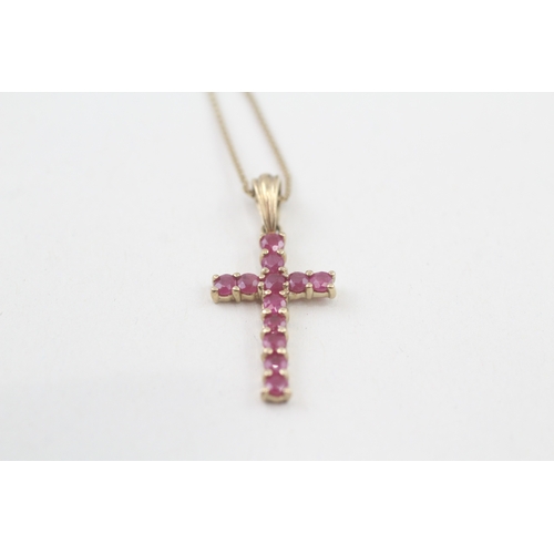 49 - 9ct gold ruby cross pendant necklace (1.8g)