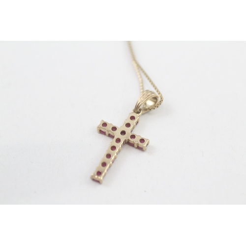 49 - 9ct gold ruby cross pendant necklace (1.8g)