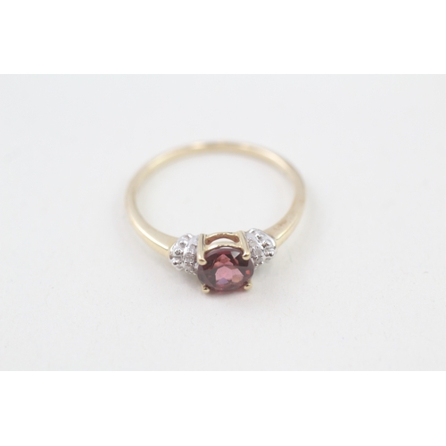 51 - 9ct gold garnet single stone ring with diamond sides (2.1g) Size  Q