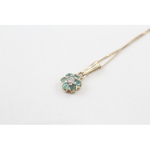 53 - 9ct gold diamond & emerald floral cluster pendant necklace (1.3g)