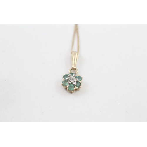 53 - 9ct gold diamond & emerald floral cluster pendant necklace (1.3g)