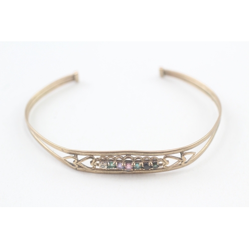 54 - 9ct gold 'DEAREST' cuff bangle set with diamond, emerald, amethyst, ruby, sapphire & tourmaline (5.1... 