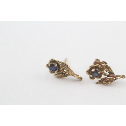 57 - 9ct gold sapphire floral earrings (1.2g)