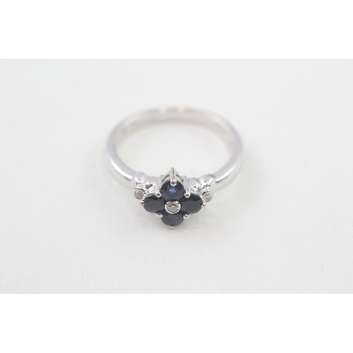 64 - 18ct white gold diamond & sapphire floral cluster ring (3.7g) Size  M