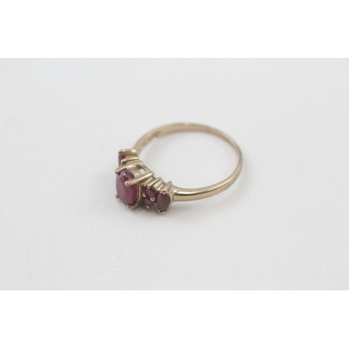 67 - 9ct gold ruby dress ring, claw set (2g) Size  O