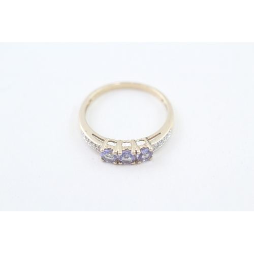 73 - 9ct gold tanzanite & diamond dress ring, claw set (1.8g) Size  P