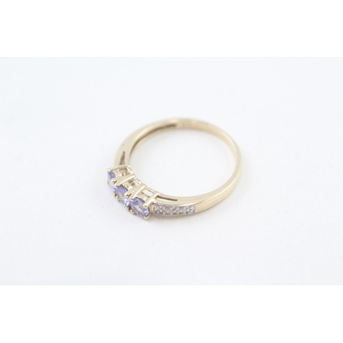 73 - 9ct gold tanzanite & diamond dress ring, claw set (1.8g) Size  P