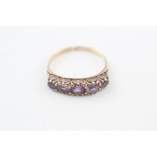 77 - 9ct gold vintage amethyst five stone ring with a scroll patterned gallery (2.5g) Size  O