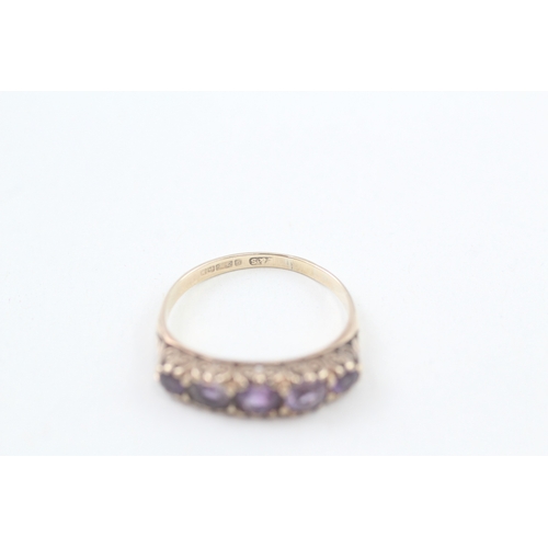 77 - 9ct gold vintage amethyst five stone ring with a scroll patterned gallery (2.5g) Size  O