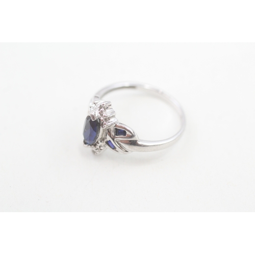 91 - 9ct white gold diamond & blue gemstone dress ring (2.1g) Size  N