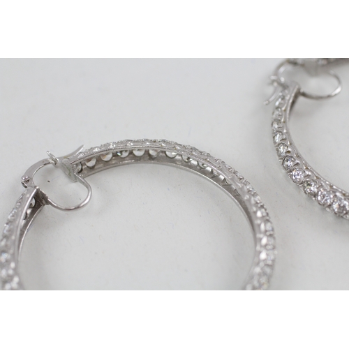 100 - 9ct white gold cubic zirconia hoop earrings (14.6g)