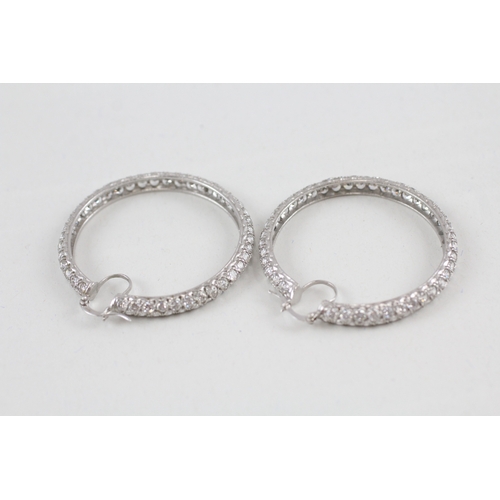 100 - 9ct white gold cubic zirconia hoop earrings (14.6g)