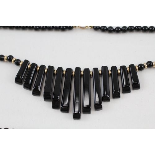 102 - 2x 9ct gold black onyx necklaces (40.4g)