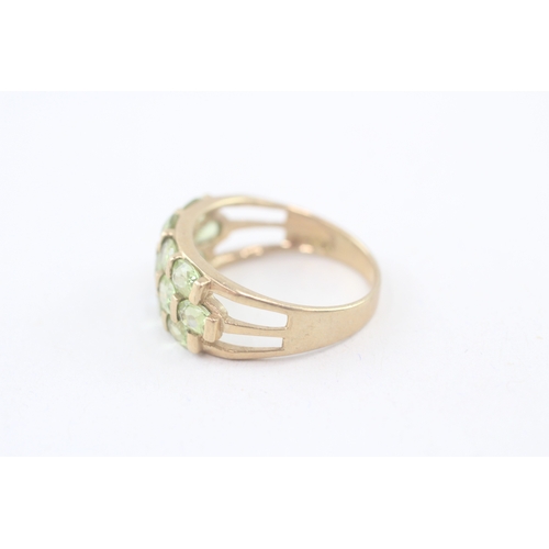 106 - 9ct gold peridot multi row cocktail ring (2.9g) Size  O