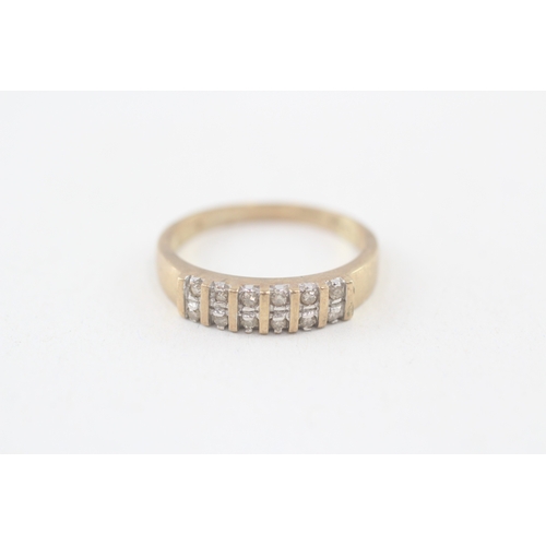 114 - 9ct gold diamond ring, bar set (2.2g) Size  N