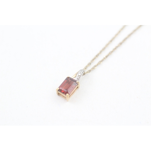 140 - 9ct gold garnet and diamond pendant with 9ct gold chain (1.5g)