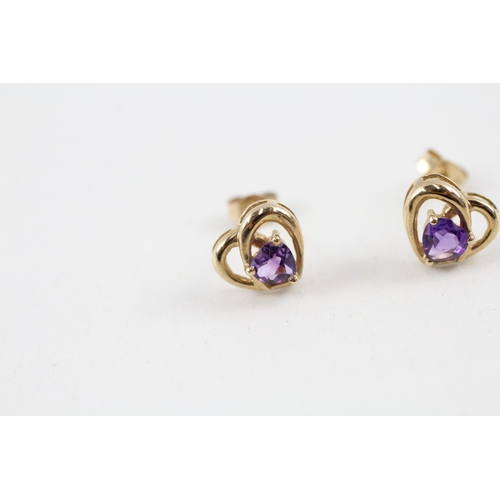 144 - 9ct gold amethyst heart shape stud earrings with scroll backs (1g)