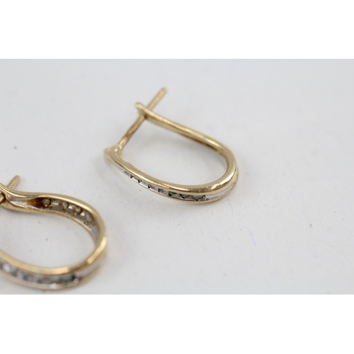 157 - 9ct gold diamond hoop earrings (2.2g)