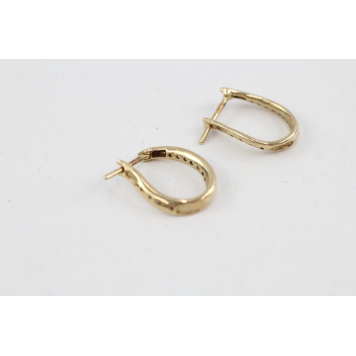 157 - 9ct gold diamond hoop earrings (2.2g)