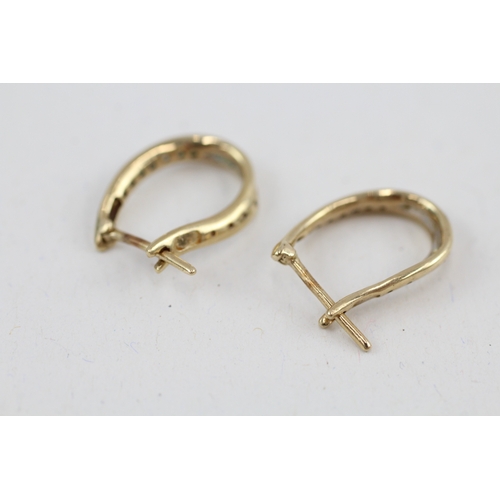 157 - 9ct gold diamond hoop earrings (2.2g)