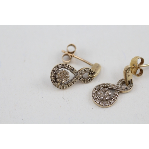 163 - 9ct gold diamond eternity drop earrings with scroll backs (1.5g)