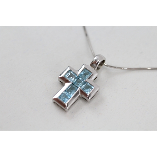 170 - 9ct gold square cut blue topaz cross pendant necklace (3.8g)