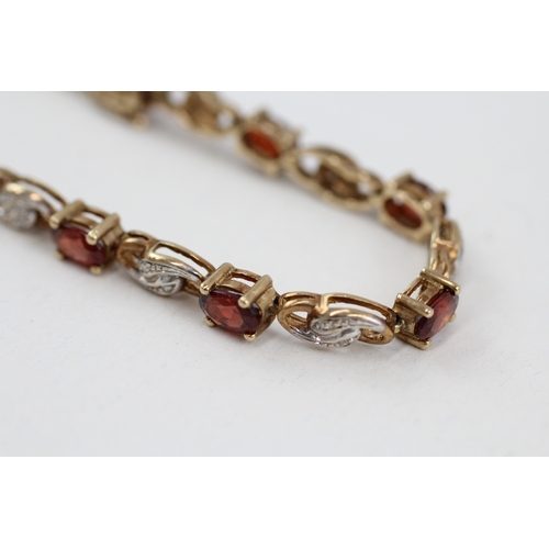 179 - 9ct gold garnet and diamond tennis bracelet (9.9g)