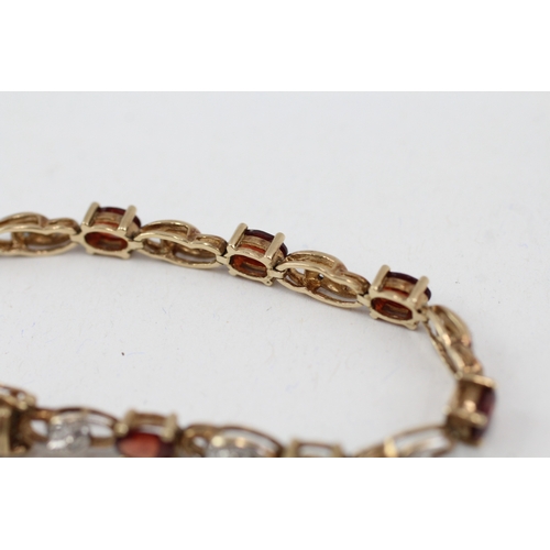 179 - 9ct gold garnet and diamond tennis bracelet (9.9g)