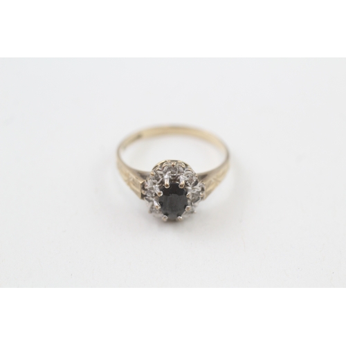 181 - 9ct gold diamond & sapphire oval halo ring (1.9g)