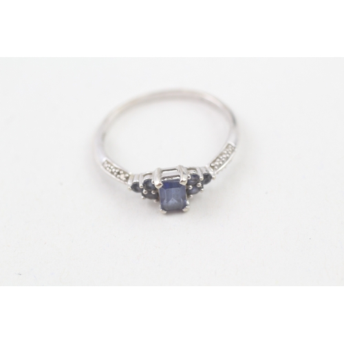 185 - 9ct white gold diamond and blue gemstone dress ring (1.7g) Size  R 1/2