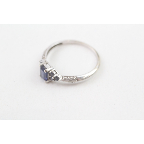 185 - 9ct white gold diamond and blue gemstone dress ring (1.7g) Size  R 1/2